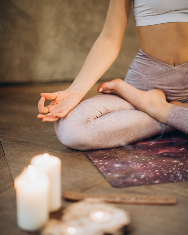A calm woman in a yoga pose, symbolizing inner peace and balance.