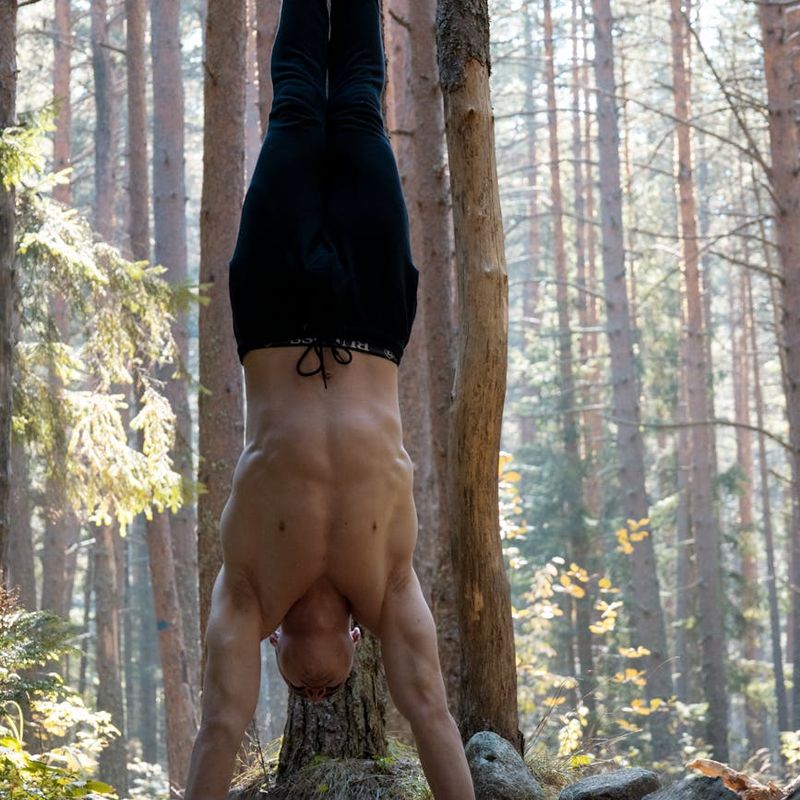Person stretching gently outdoors, feeling the energy of nature.